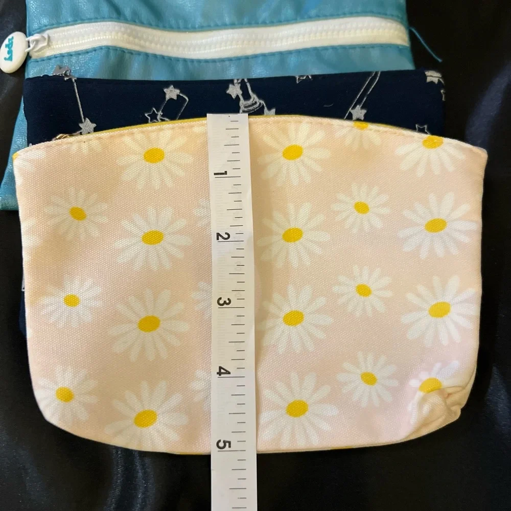 Three never used Ipsy cosmetic bags. Great for your girls birthday parties.